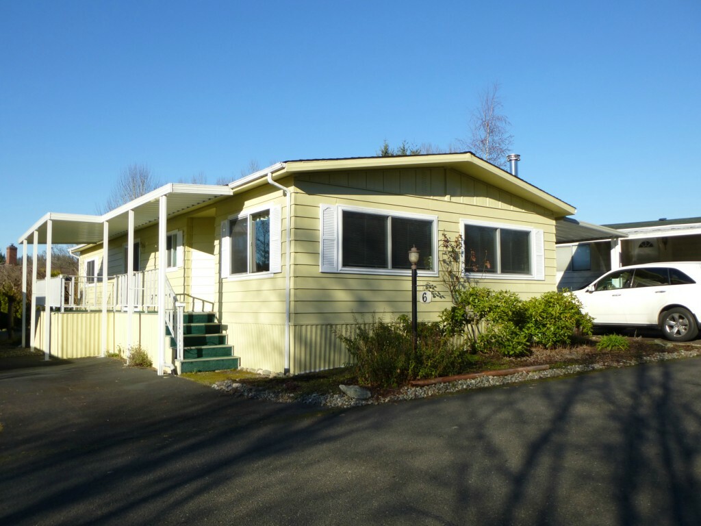 Property Photo:  1121 244th St SW 6  WA 98021 