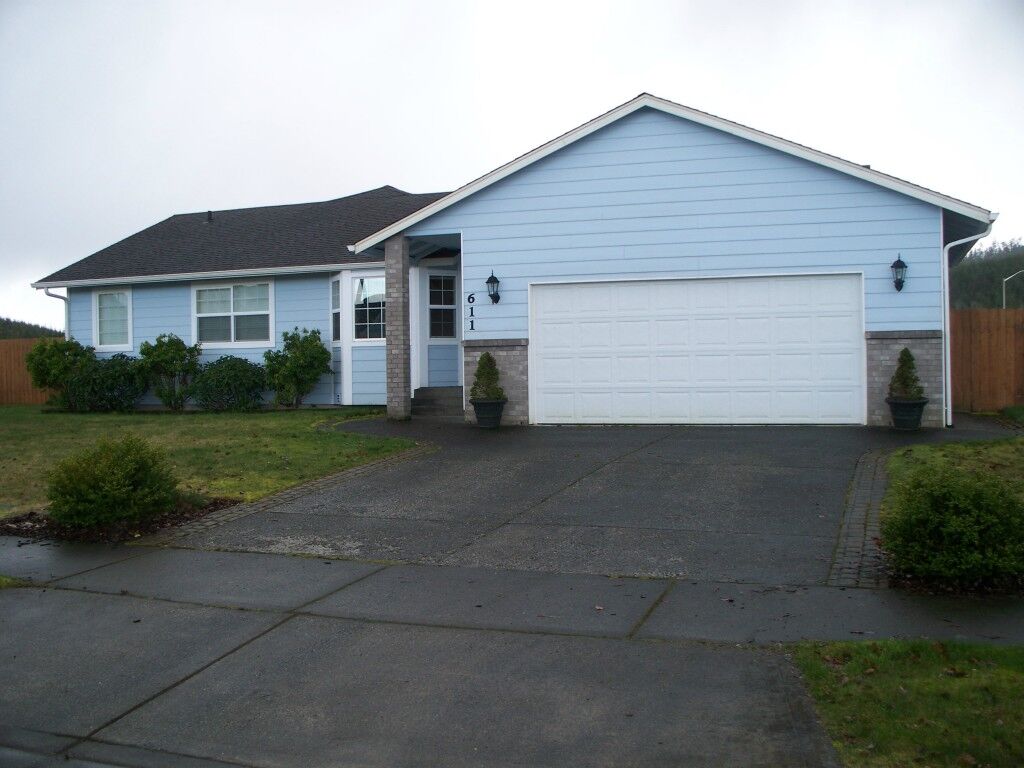 Property Photo:  611 Troon Ave  WA 98537 