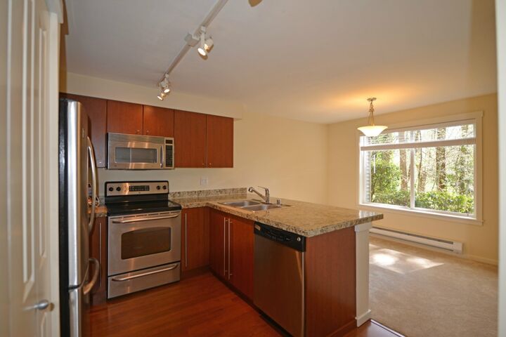 Property Photo:  11229 NE 128th Street H 103  WA 98034 