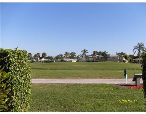 Property Photo:  13721 Flora Place A  FL 33484 