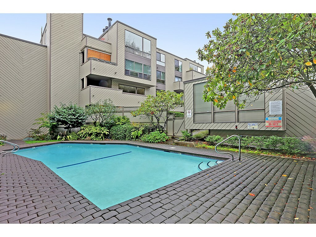 Property Photo:  3710 26th Place W 409  WA 98199 