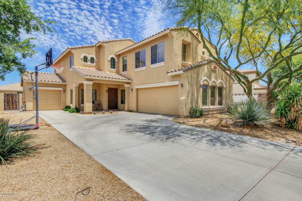 Property Photo:  6697 S Garnet Way  AZ 85249 