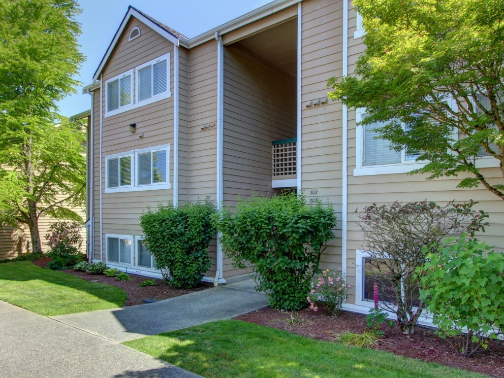 Property Photo:  12411 109th Ct NE C-102  WA 98034 