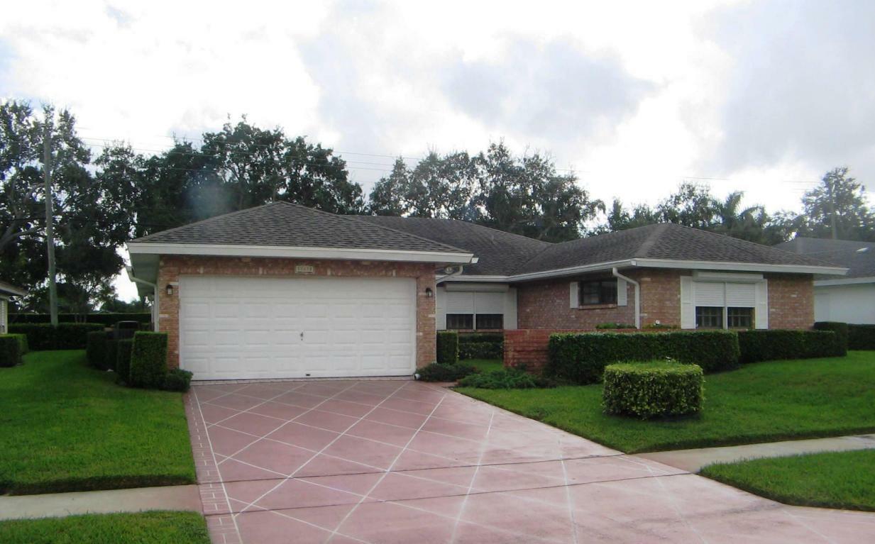 Property Photo:  10682 Greentrail Drive S  FL 33436 