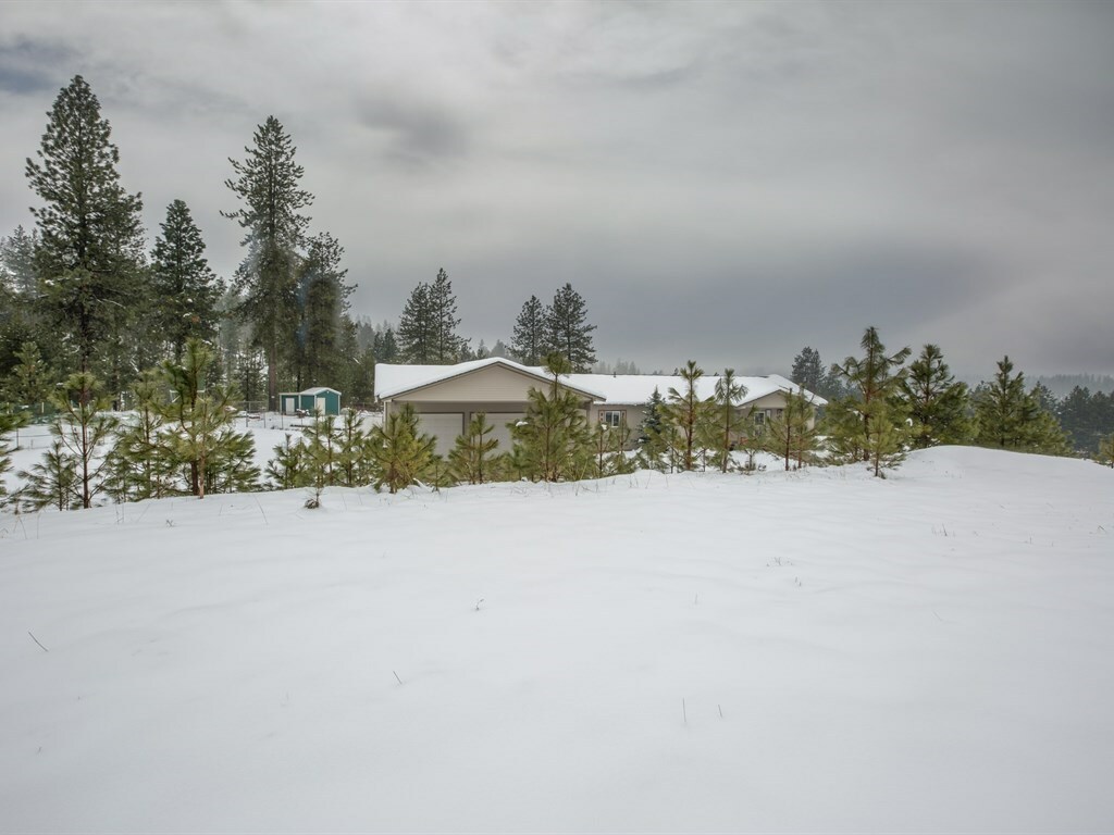 Property Photo: 6404 E Snowy River Ln WA 99003