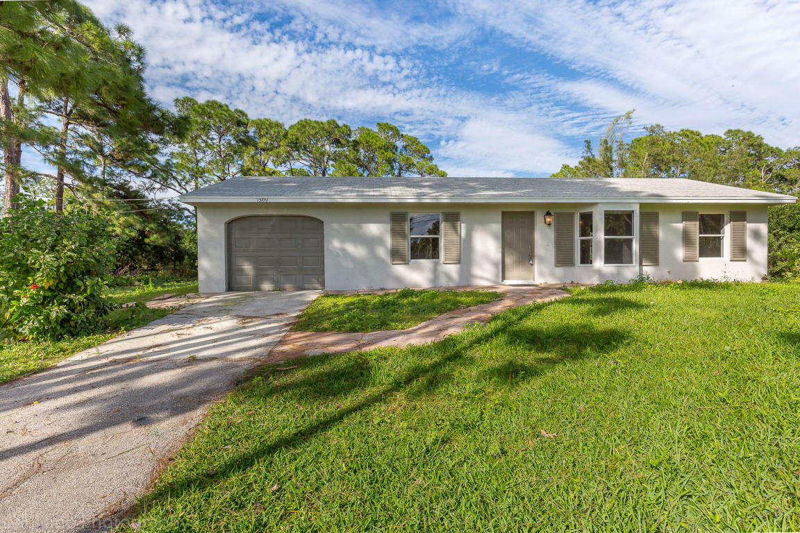 Property Photo:  15779 Tangerine Boulevard  FL 33470 