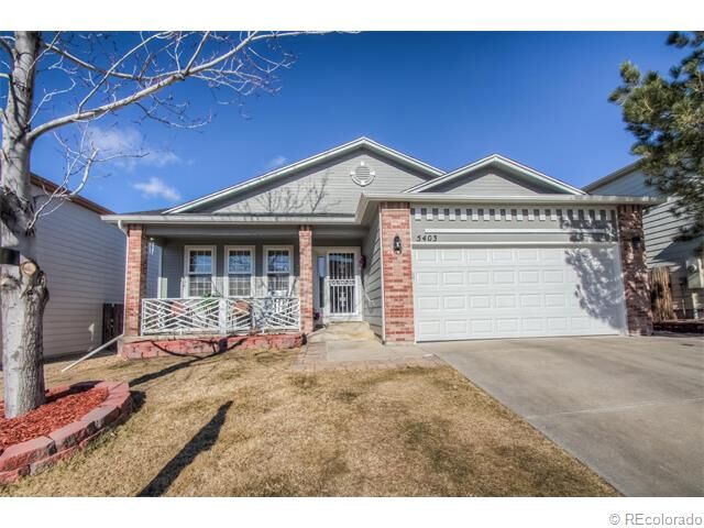 Property Photo:  5403 South Versailles Street  CO 80015 