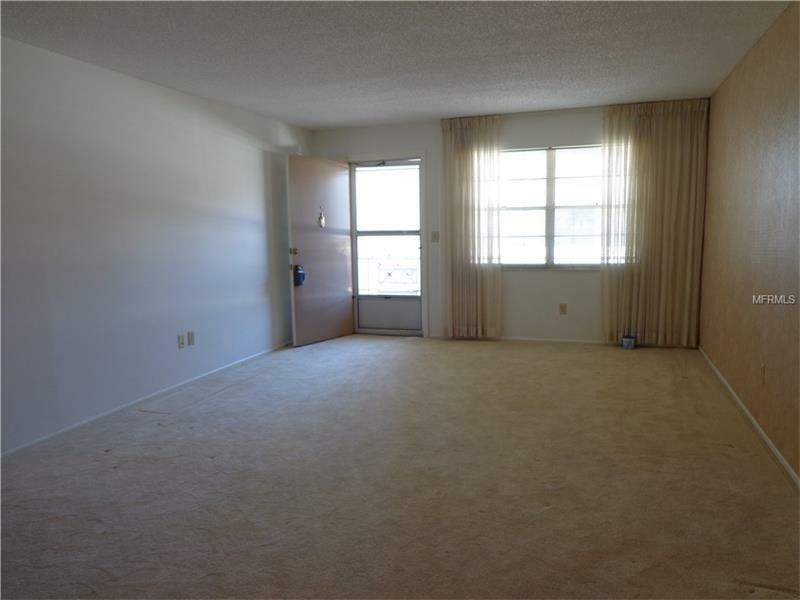 Property Photo:  5705 80th Street N 215  FL 33709 