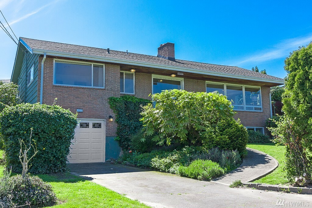 Property Photo:  10673 Forest Ave S  WA 98178 
