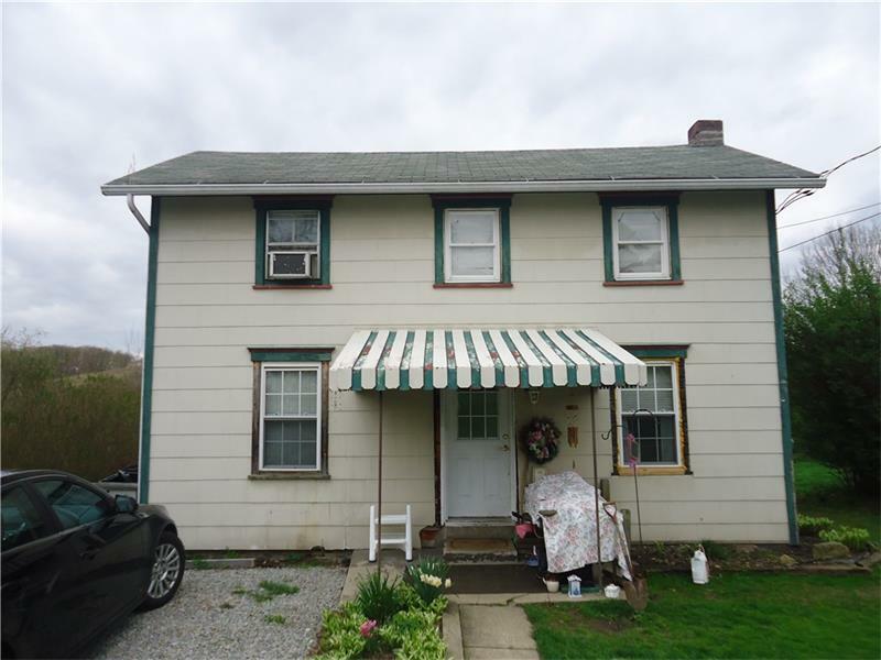 Property Photo:  7615 State Rt 819  PA 15639 