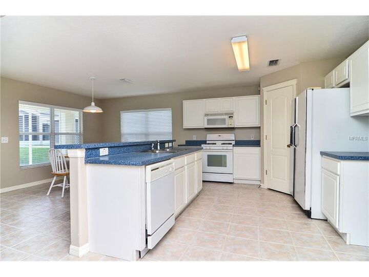 Property Photo: 5638 Tanagergrove Way FL 33547