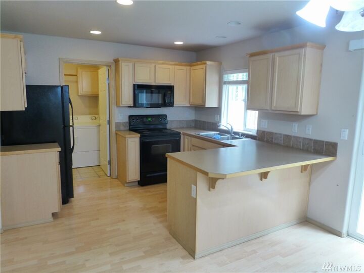 Property Photo:  22443 SE 244th St  WA 98038 
