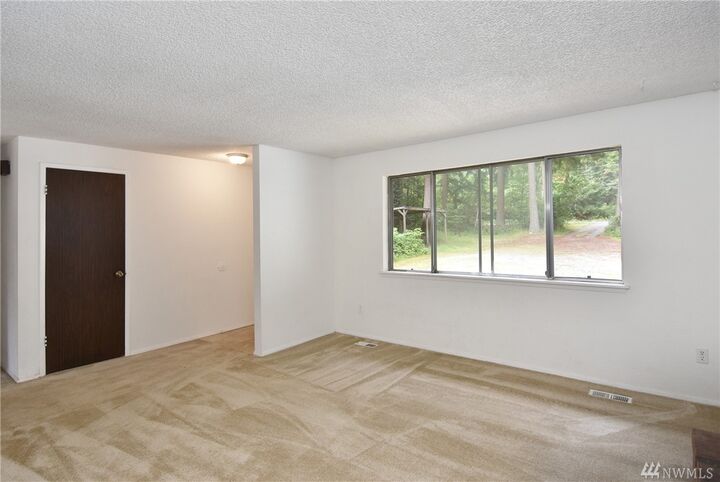 Property Photo: 18015 S Tapps Dr E WA 98391