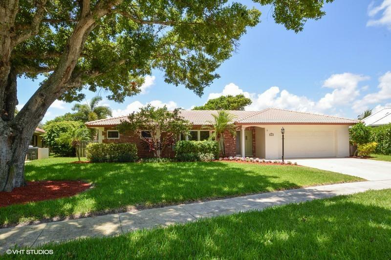 Property Photo:  660 SW 16th Street  FL 33486 