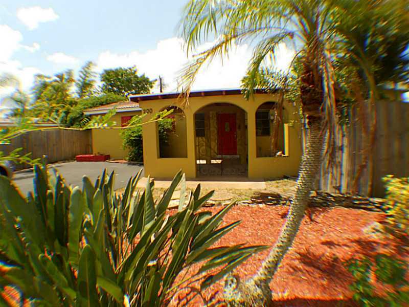 Property Photo:  200 NE 57 St  FL 33334 