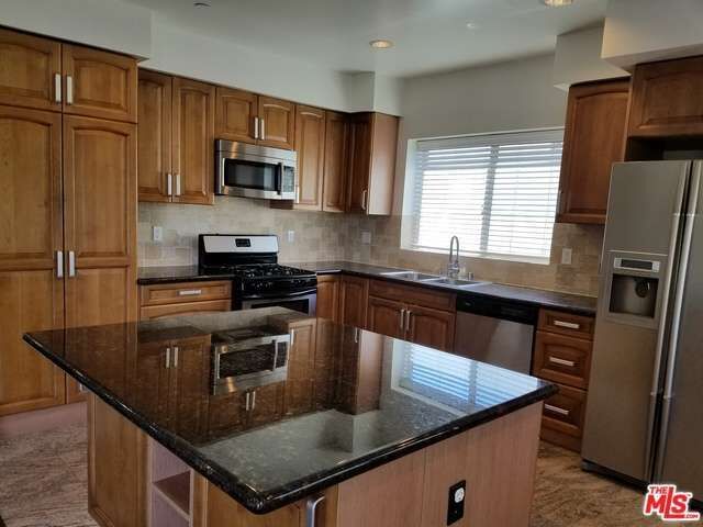 Property Photo:  11218 Camarillo St 306  CA 91602 