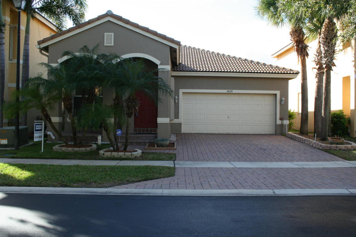 Property Photo:  6639 Jacques Way  FL 33463 
