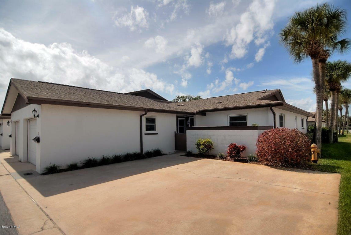 Property Photo:  290 Paradise Boulevard  FL 32903 