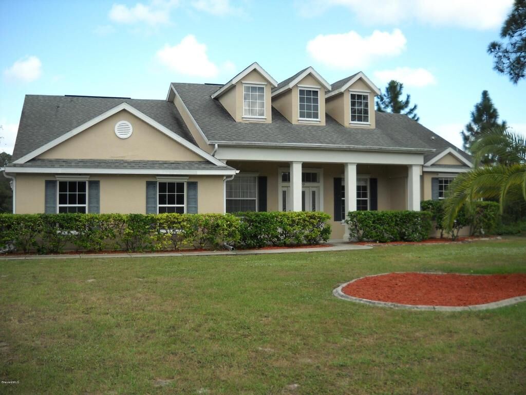 Property Photo: 4859 Mildred Court FL 32927