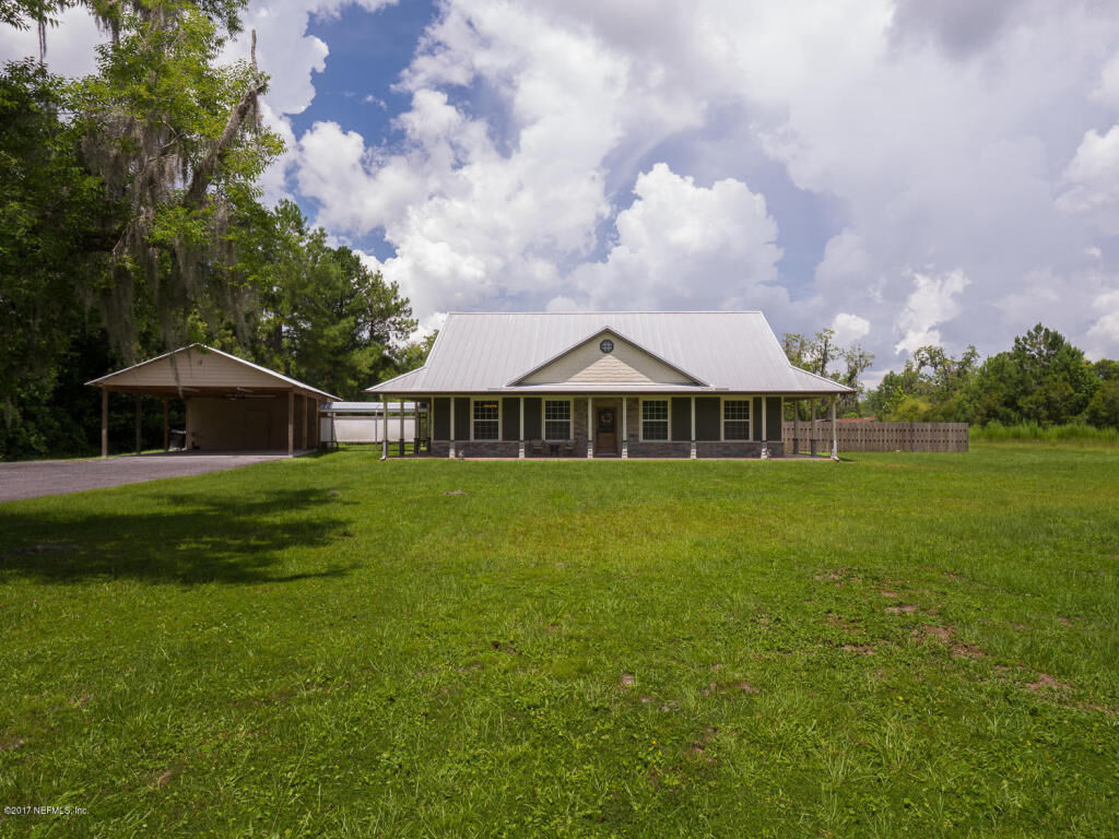 Property Photo:  10488 SE 49 Avenue  FL 32091 