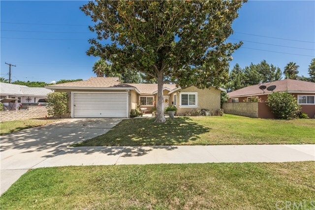 Property Photo:  8566 Basswood Avenue  CA 92504 