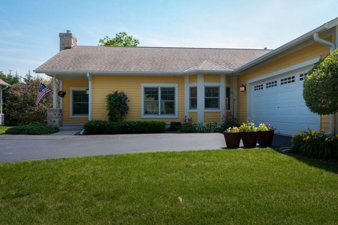 Property Photo:  N68w5671 Bridge Commons Ct  WI 53012 