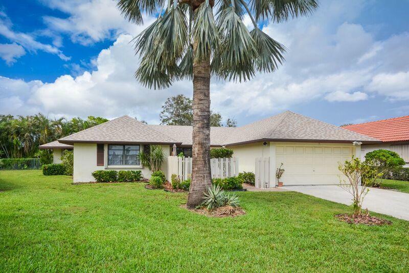 Property Photo:  10275 Greentrail Drive N  FL 33436 