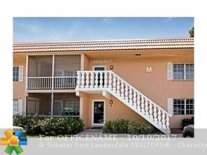 Property Photo: 200 NE 19th Ct 114-M FL 33305