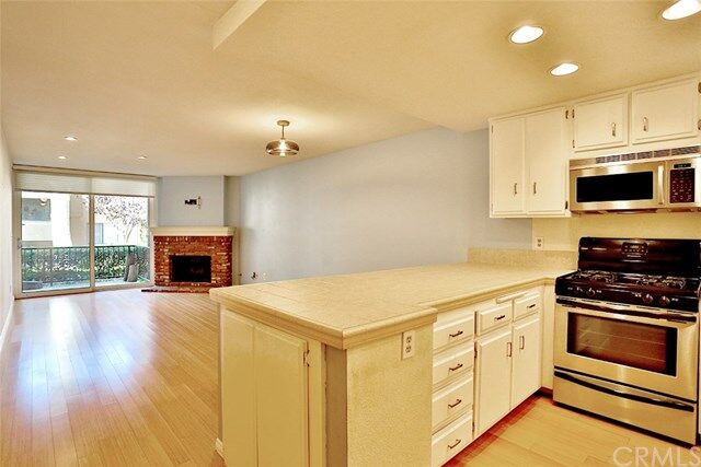 Property Photo:  7911 Woodlake Drive 80  CA 92647 