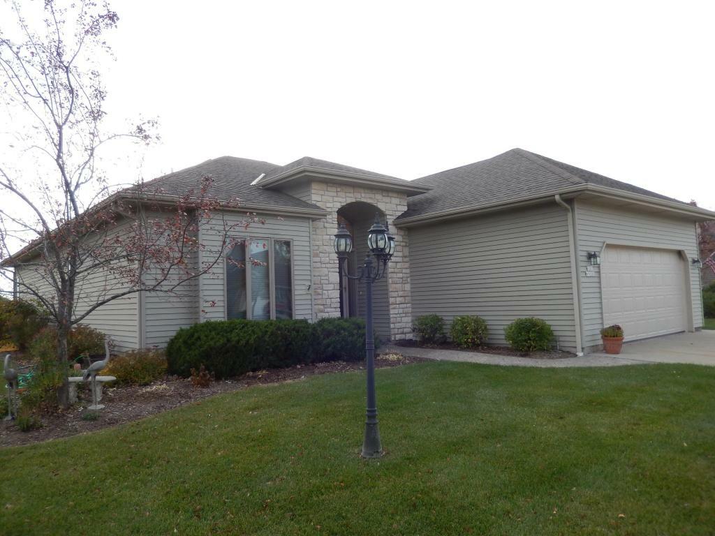 Property Photo:  W203n16385 White Oak Cir  WI 53037-9296 