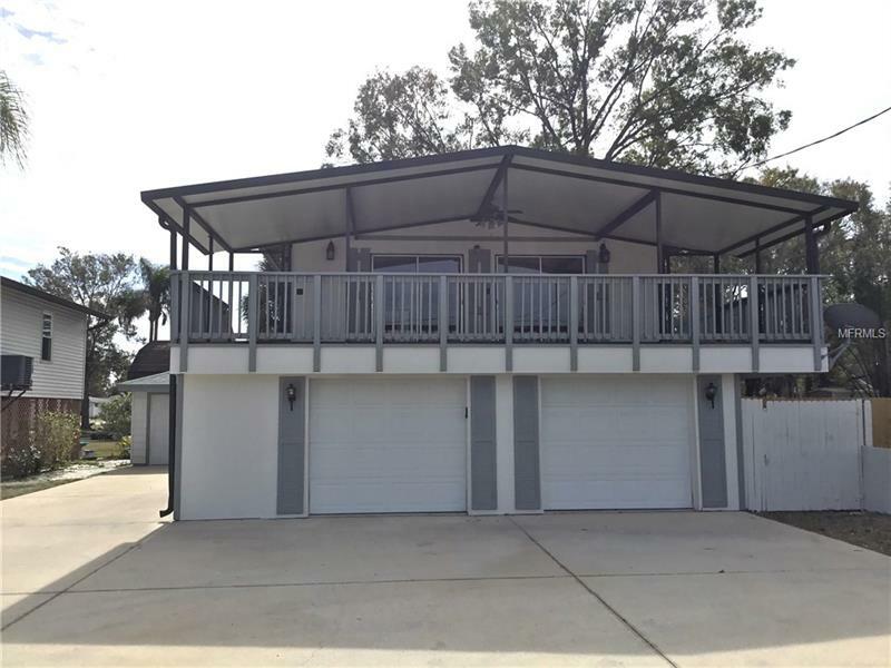 Property Photo: 303 Saint Petersburg Drive W FL 34677