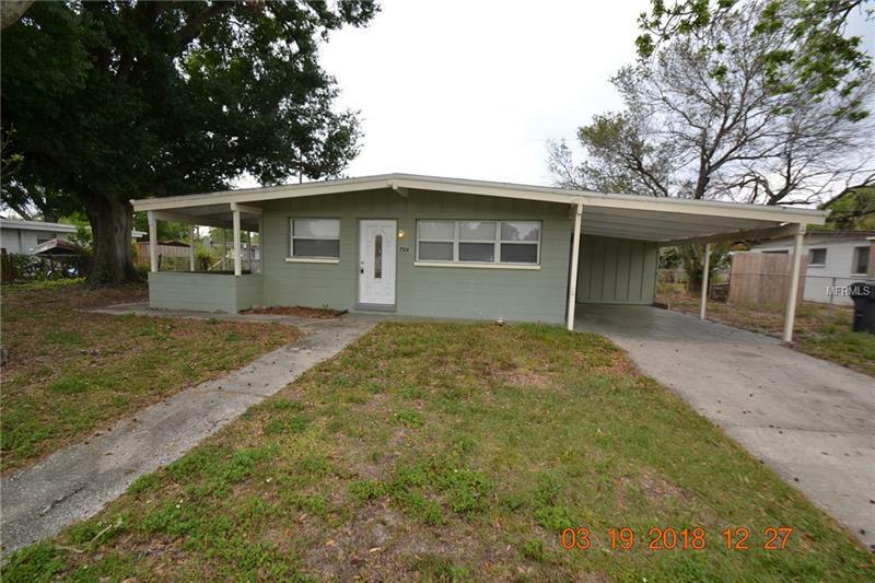 Property Photo:  7504 Carolton Circle  FL 33619 