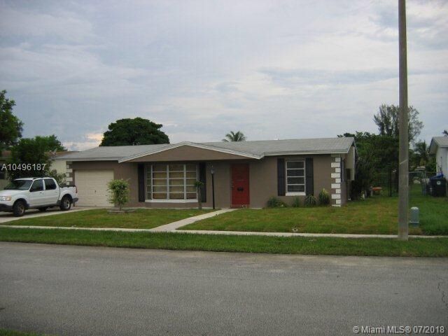 Property Photo:  6551 SW 7th Ct  FL 33068 