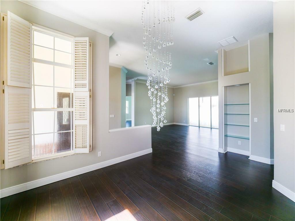 Property Photo: 4996 Camberley Lane FL 34677