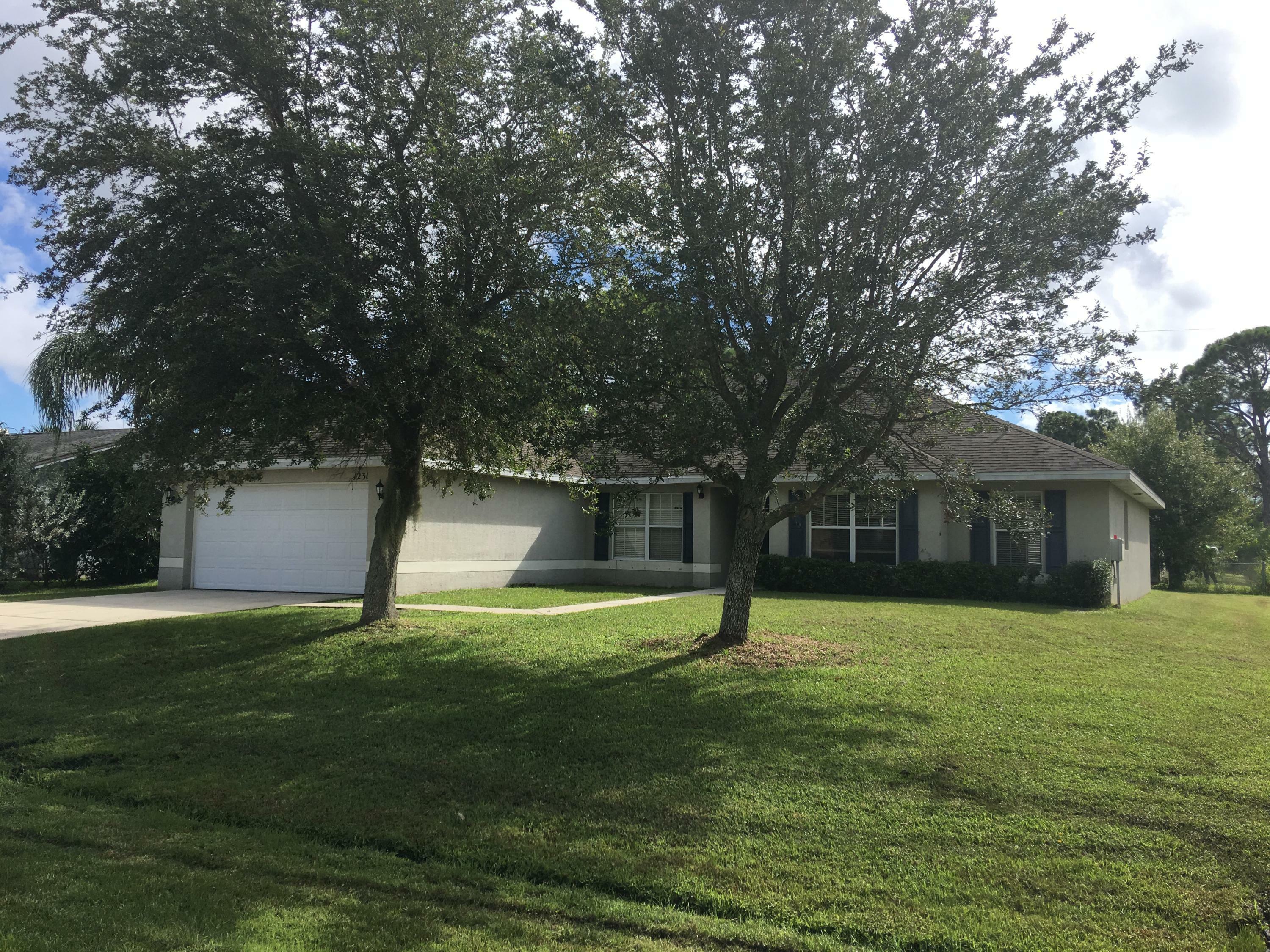 Property Photo:  1231 SW Curry Street  FL 34983 