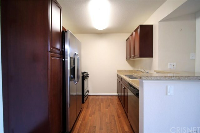 Property Photo:  5545 Canoga Avenue 301  CA 91367 