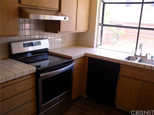 Property Photo:  18535 Mayall Street L  CA 91324 