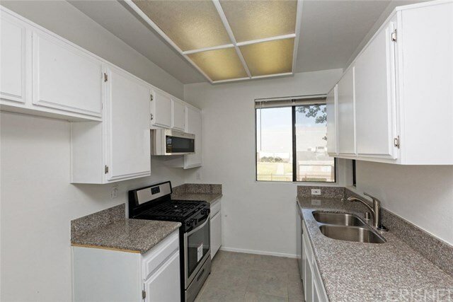 Property Photo:  7211 Cozycroft Avenue 34  CA 91306 