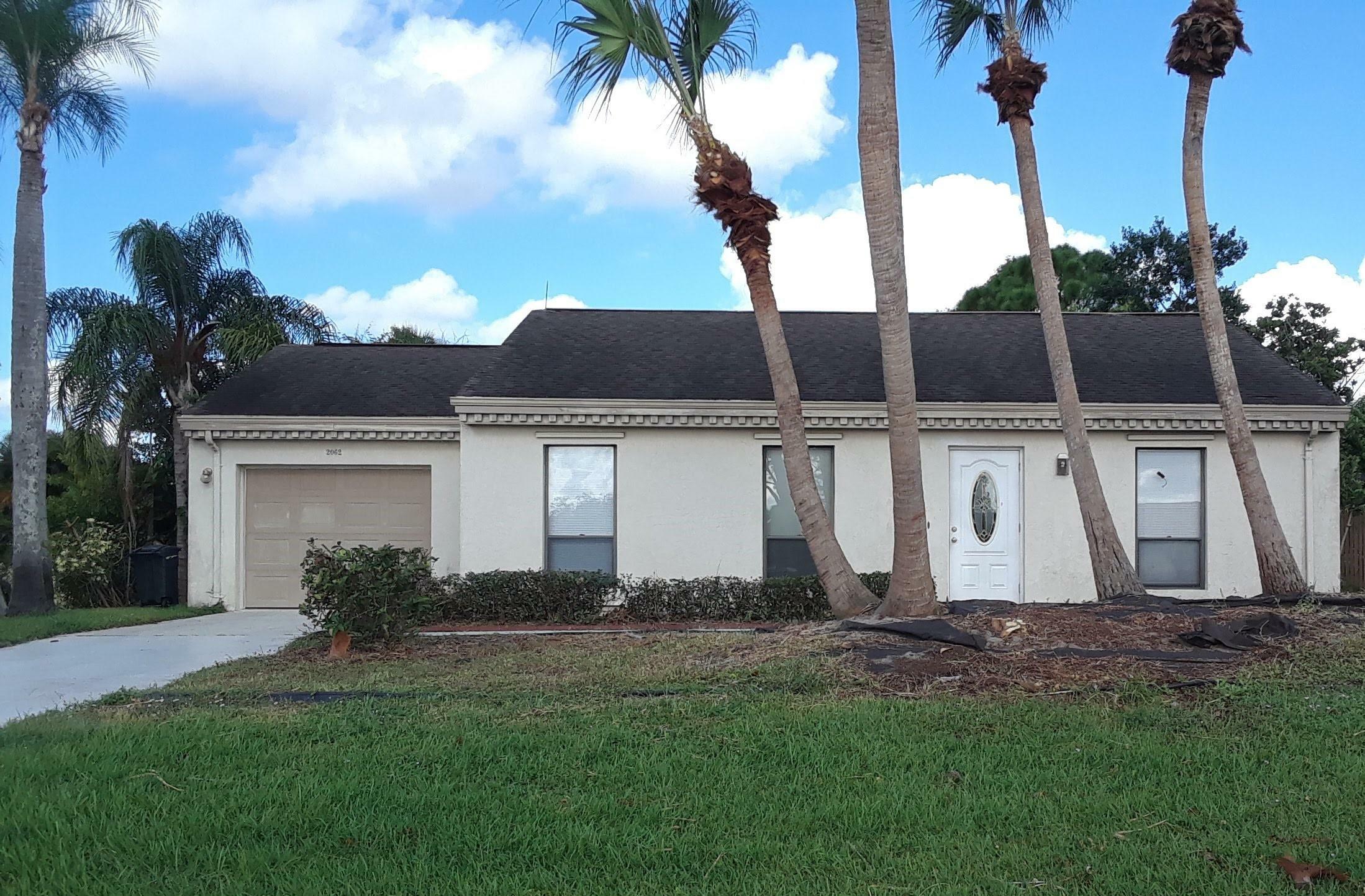 Property Photo:  2062 SE Doverbrook Street  FL 34983 