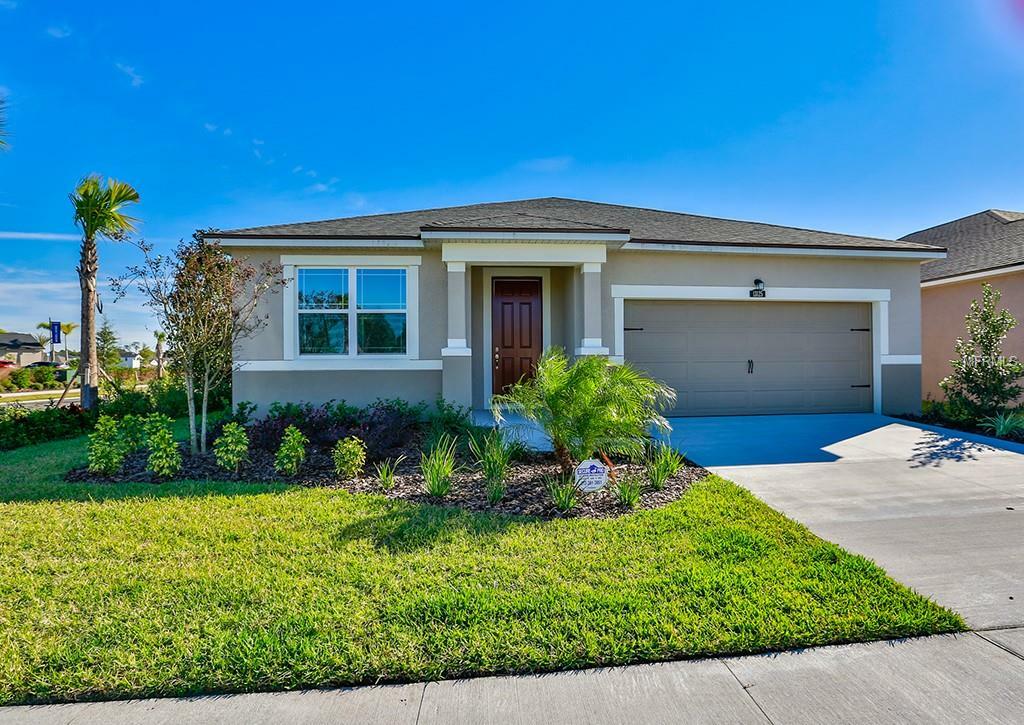 Property Photo:  13125 Rain Lily Drive 140E  FL 33579 