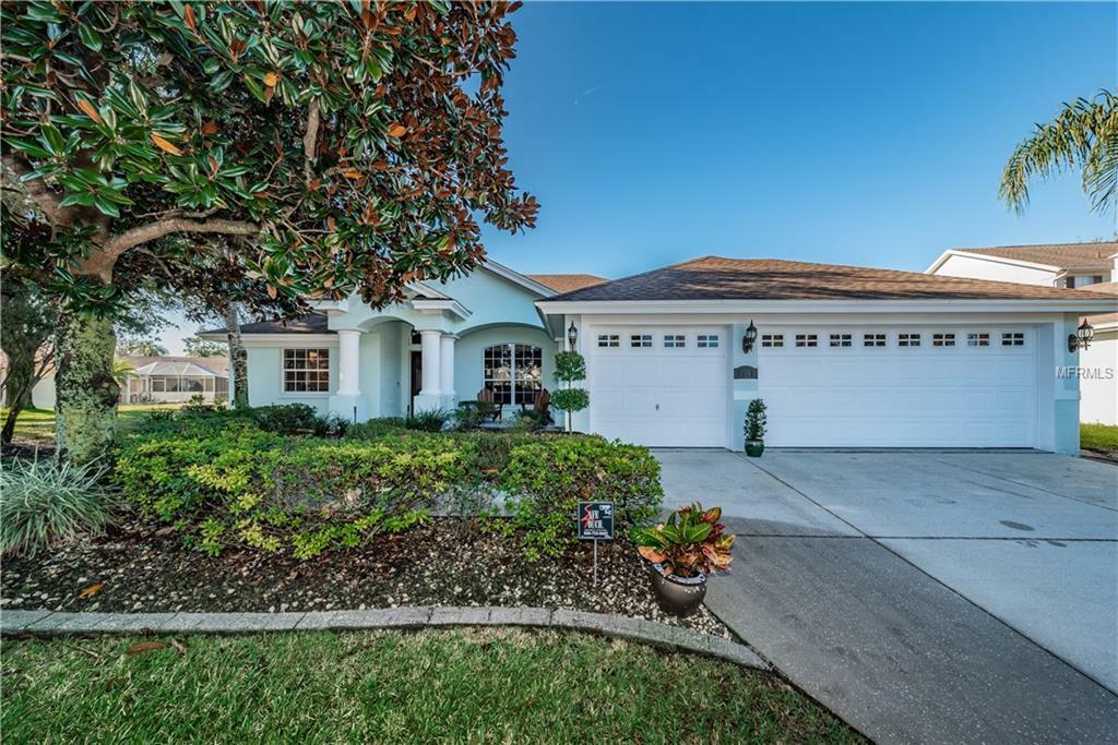 Property Photo:  1002 Sawgrass Drive  FL 34689 