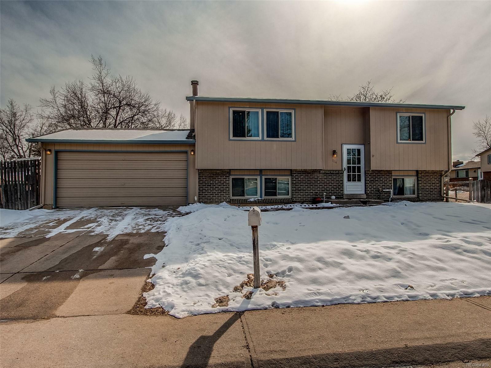 Property Photo:  7114 West Hinsdale Drive  CO 80128 