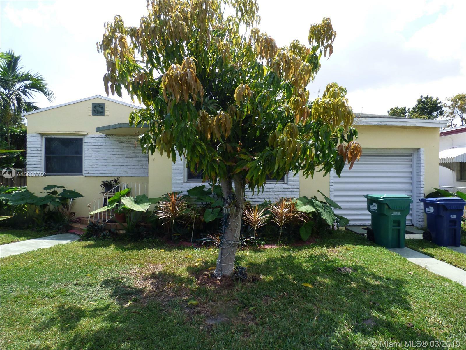 Property Photo: 1028 NW 77th St FL 33150