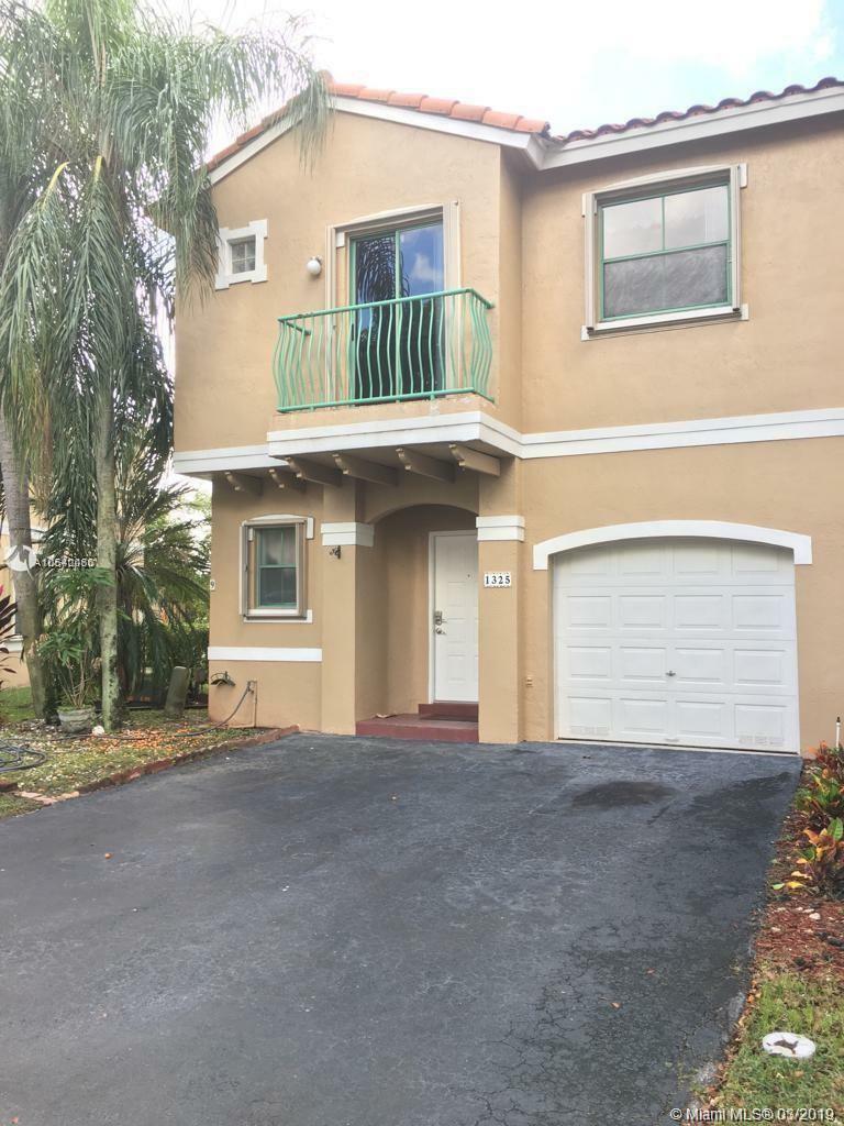 Property Photo: 1325 NW 126th Way 1325 FL 33323