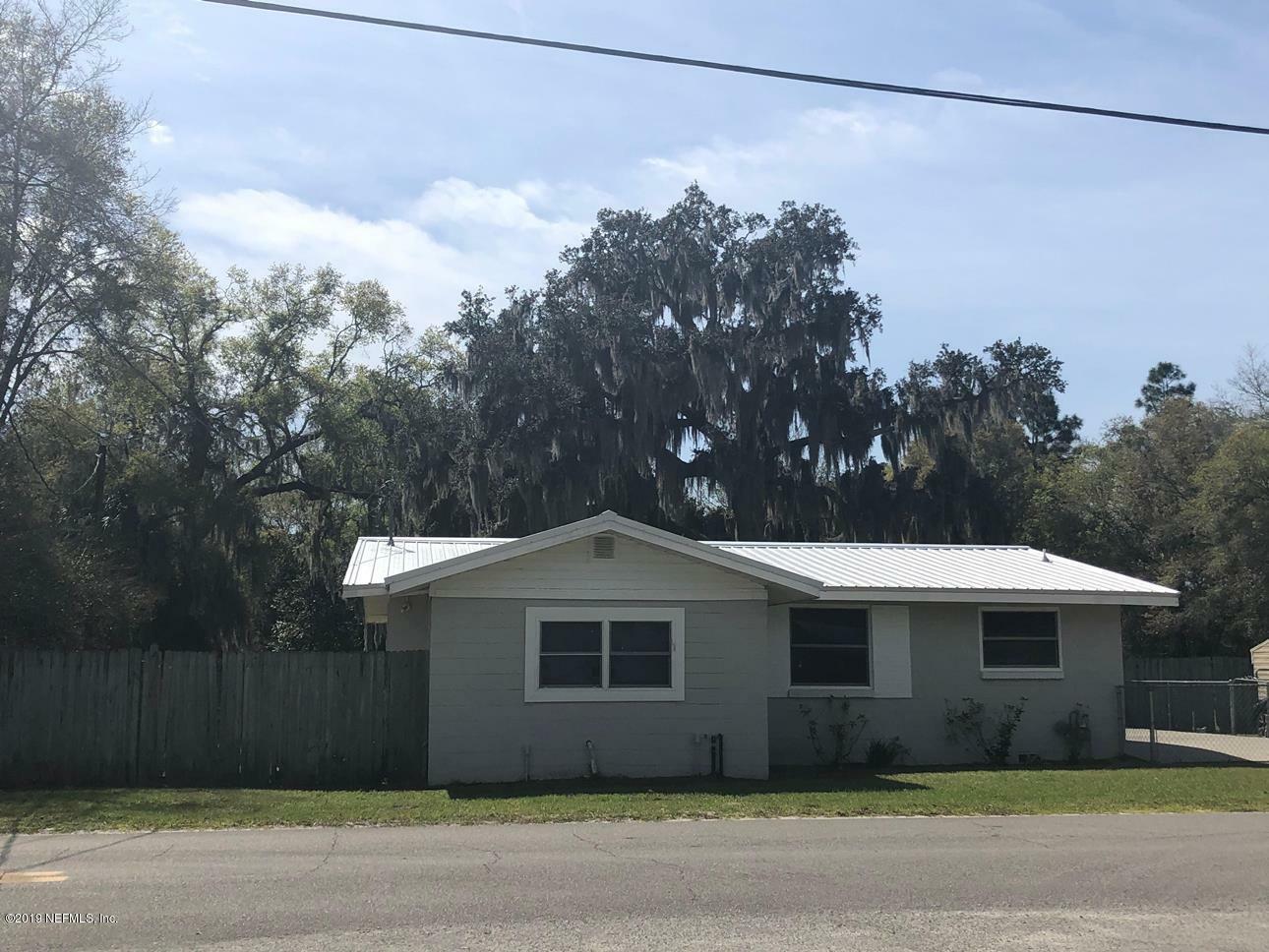 Property Photo:  105 3rd Avenue  FL 32177 