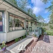 Property Photo:  1068 Puget Dr E  WA 98366 