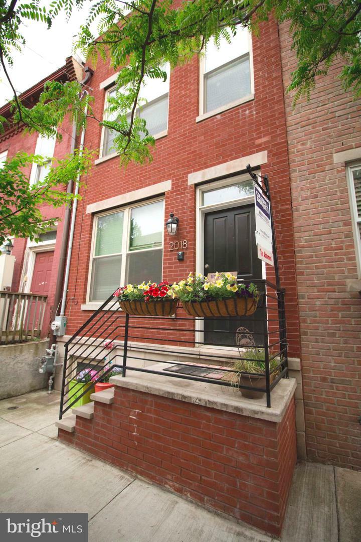 Property Photo:  2018 Federal Street  PA 19146 