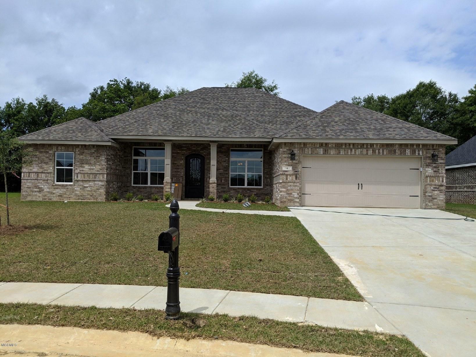 Property Photo:  7961 Village Green Drive  MS 39532 