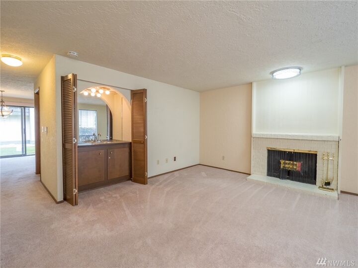 Property Photo:  12600  4th Avenue W 7J  WA 98204 