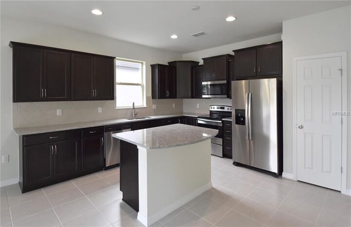 Property Photo:  3521 Starkey Drive  FL 34744 
